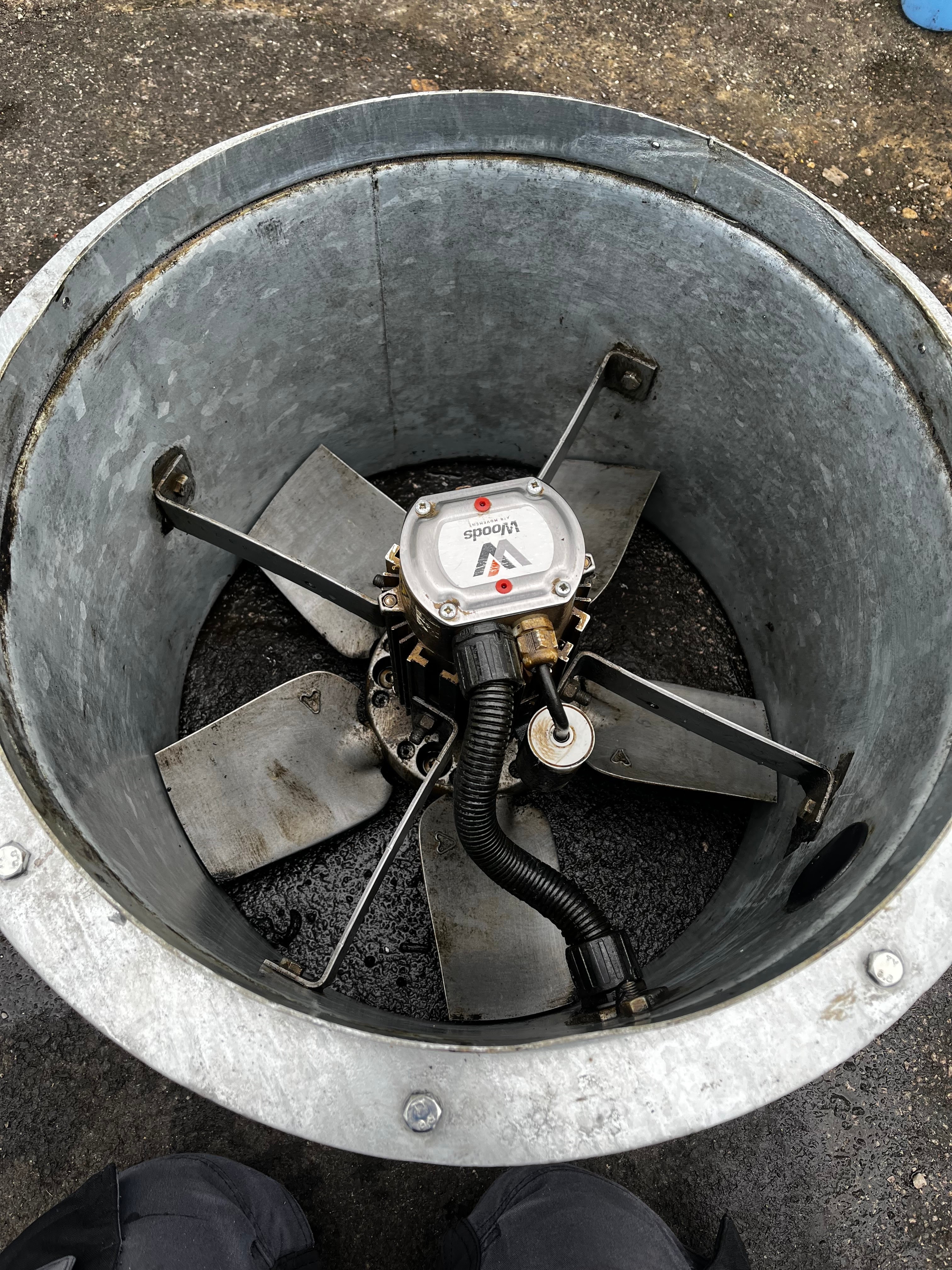 Commercial fan service by CAN Electrical Contractors Limited, showing the motor and impeller