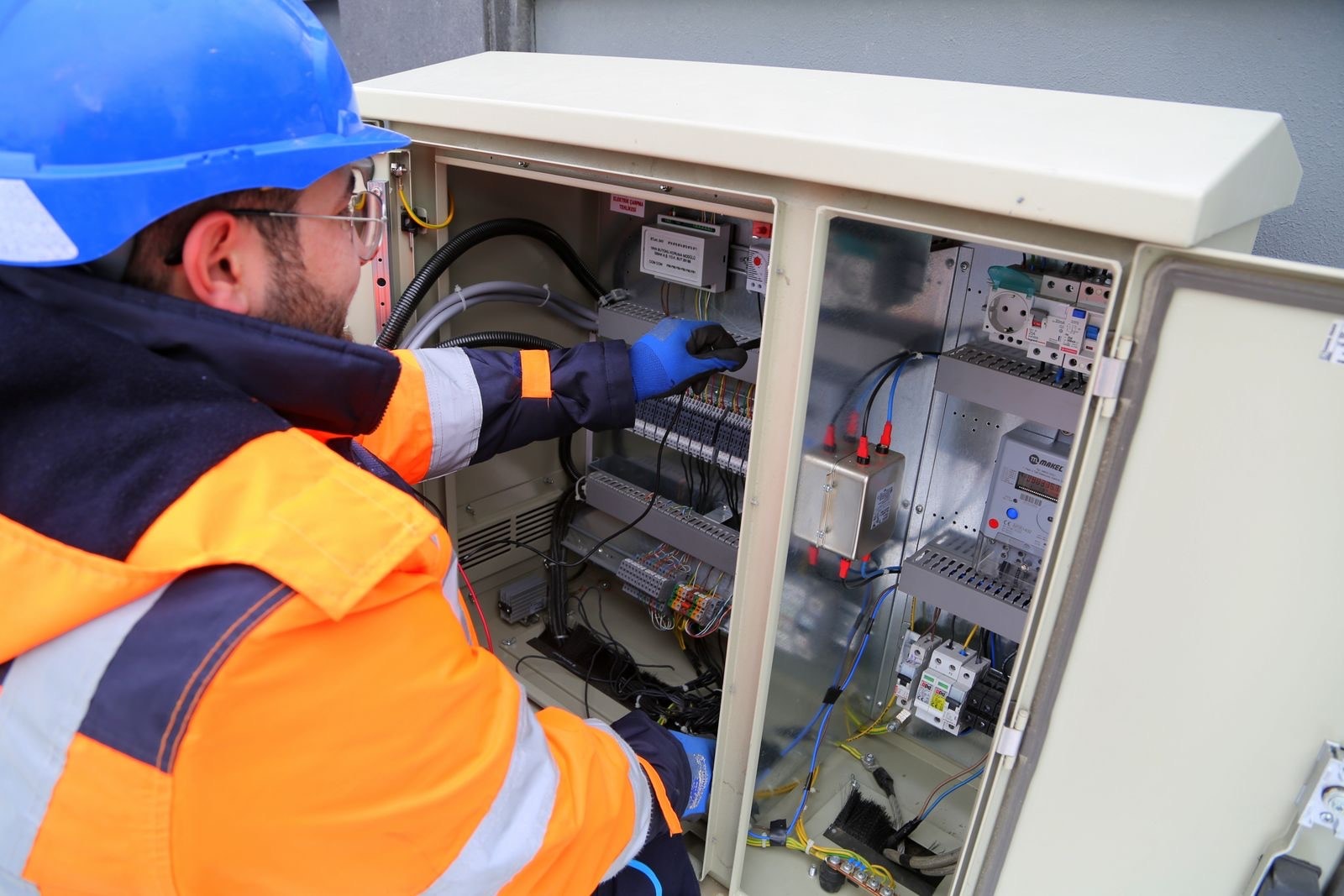 Electrician working on a distribution cabinet